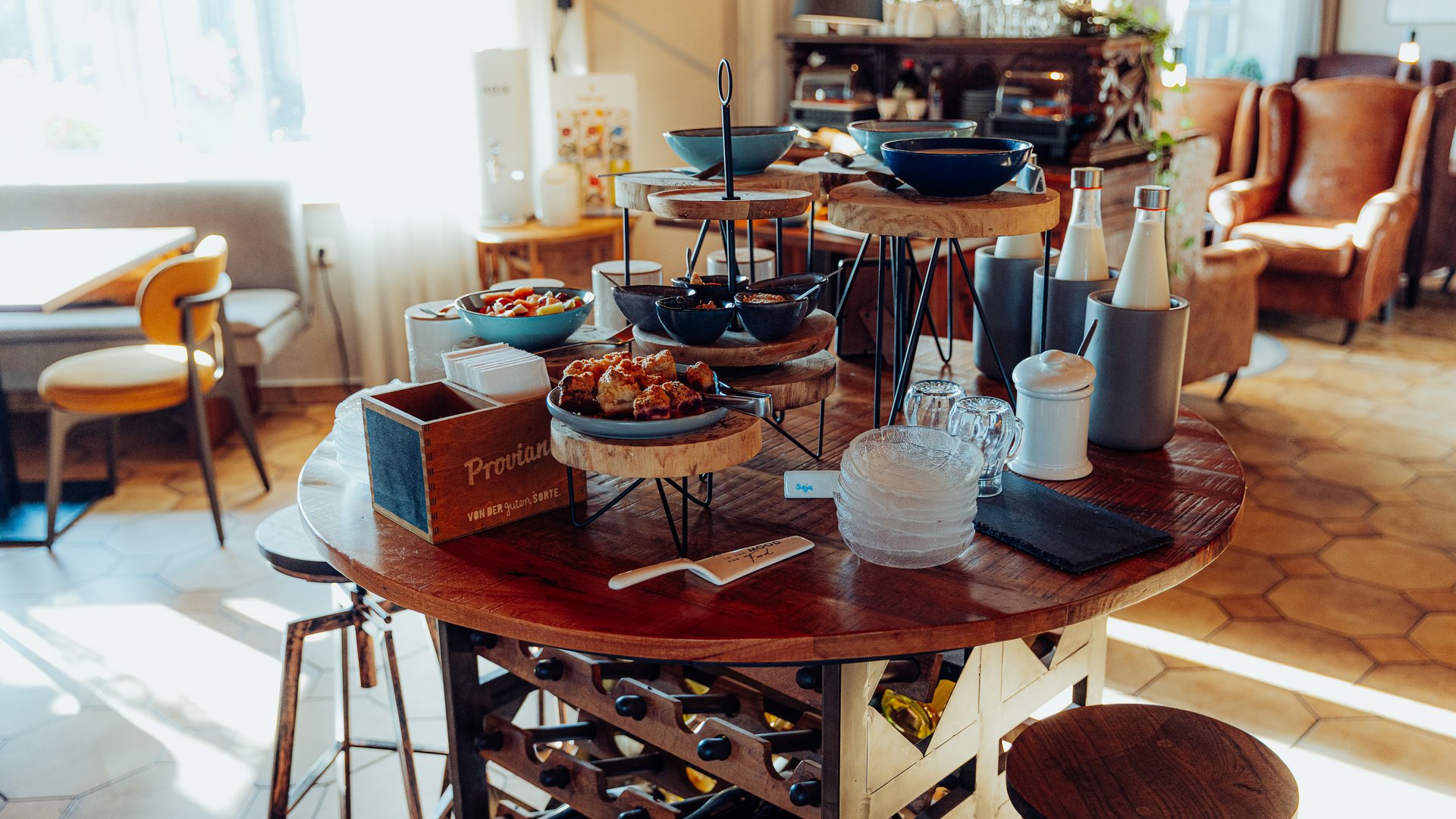 Breakfast at our restaurant Seeblick in Gronau Breakfast buffet with food and drinks on a round table