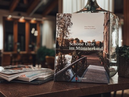 Restaurant Gronau: Seeblick Book Beautiful Places in Münsterland on wooden table in cozy room